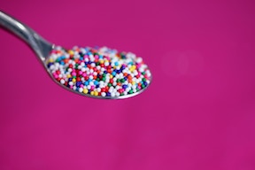 Colored sprinkles on a spoon 