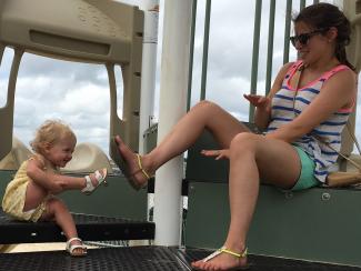 toddler and her mom at playground